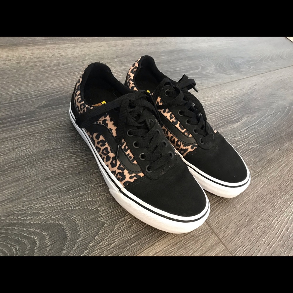 Black and cheetah print women’s Vans